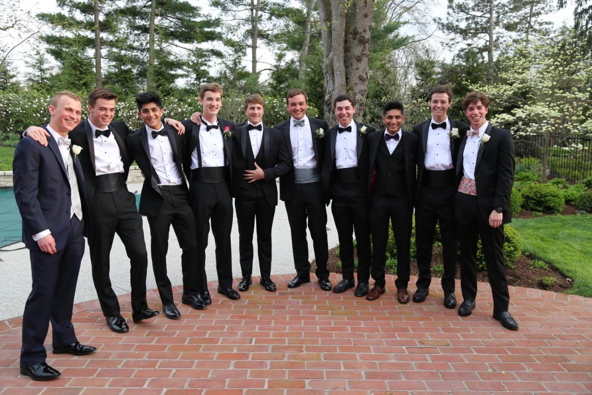 Class of 2018 seniors smilie with their bowties. Which ones are pre-tied?